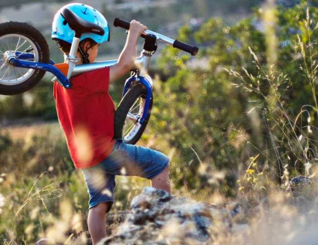 child carrying lightweight balance bike